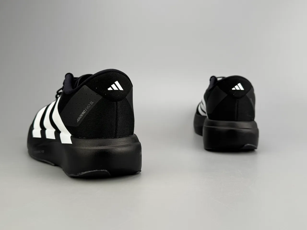 Adidas Adizero Evo SL Chaussures de course noires et blanches 6