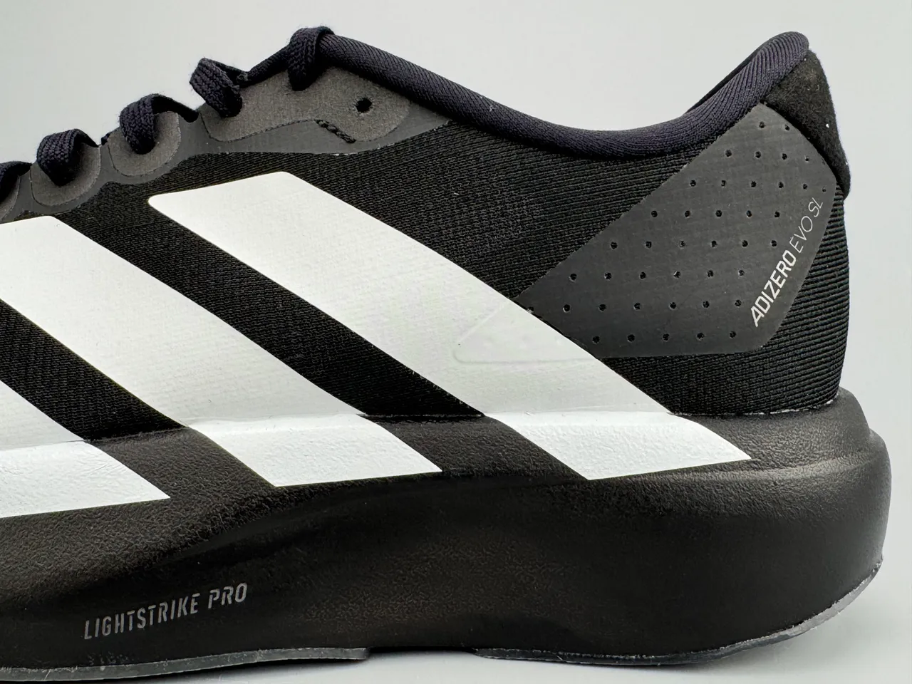 Adidas Adizero Evo SL Chaussures de course noires et blanches 7