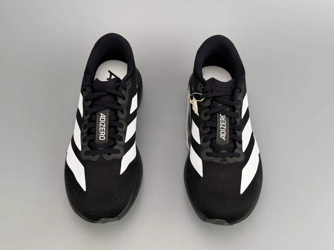 Adidas Adizero Evo SL Chaussures de course noires et blanches 9