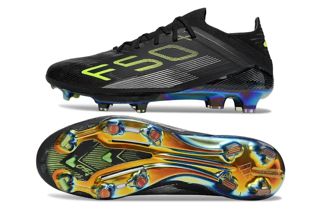 Adidas Zapatos de fútbol con upper sintético negro y verde, neón lima, texto gráfico y superficie de césped artificial 6