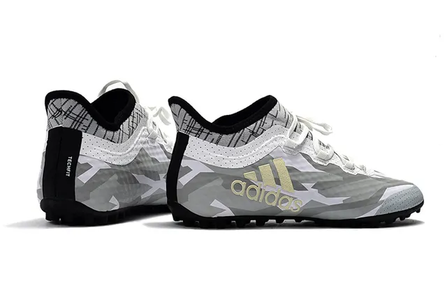 Adidas Chaussures de football turf coupe basse upper synthétique color blocking multicolor avec dégradé noir 11