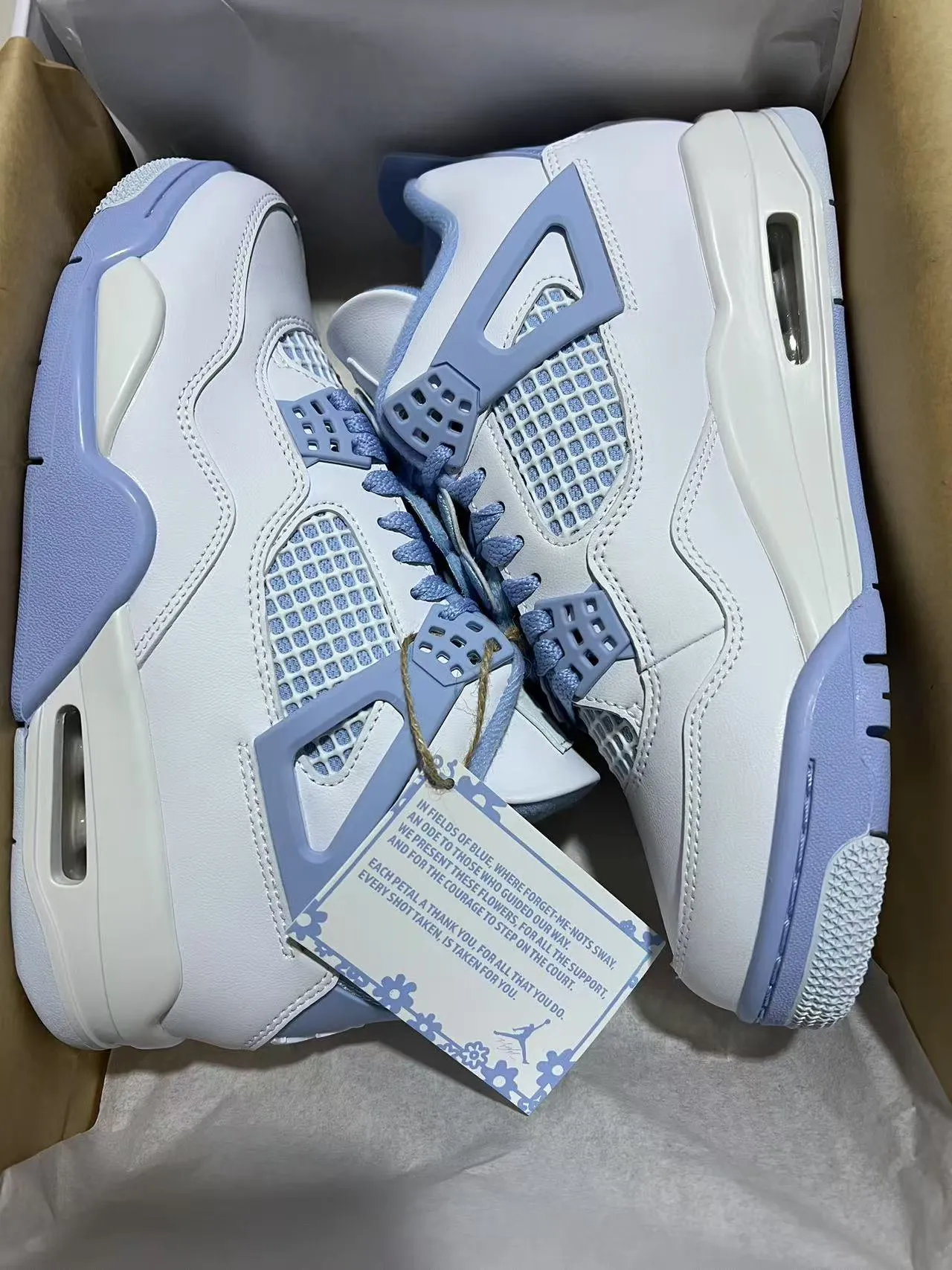 Chaussures de basketball Air Jordan 4 Retro blanc et bleu clair 9