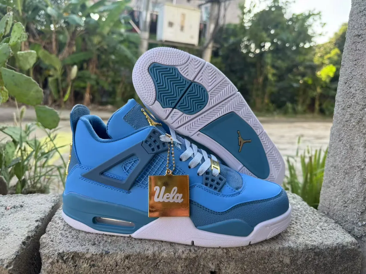 Air Jordan 4 UCLA Blue Tênis de Basquete 3