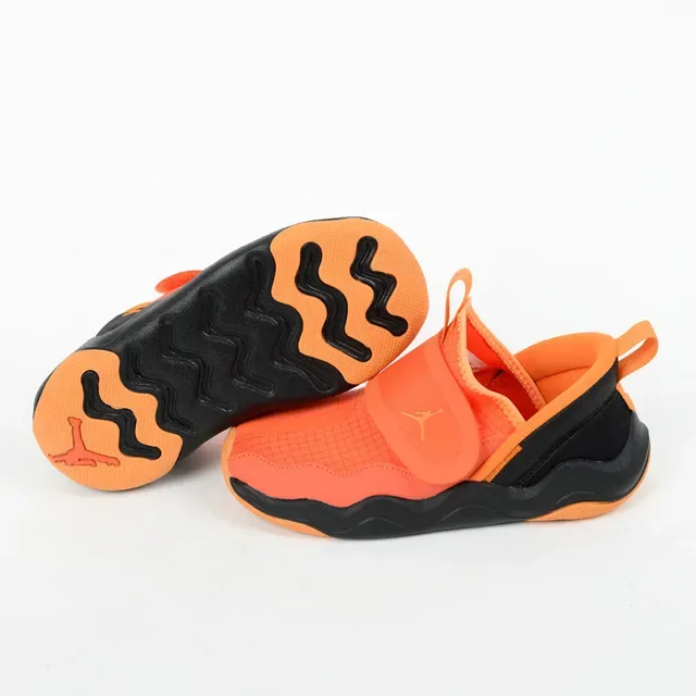 Sneakers lifestyle sans lacets Air Jordan à semelle intermédiaire ondulée orange et noir 4