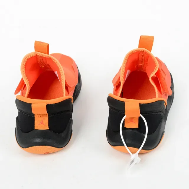 Sneakers lifestyle sans lacets Air Jordan à semelle intermédiaire ondulée orange et noir 5