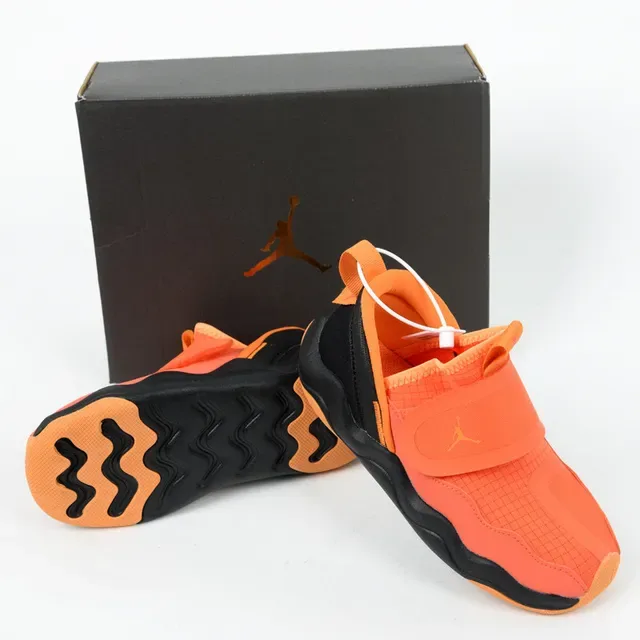 Sneakers lifestyle sans lacets Air Jordan à semelle intermédiaire ondulée orange et noir 9