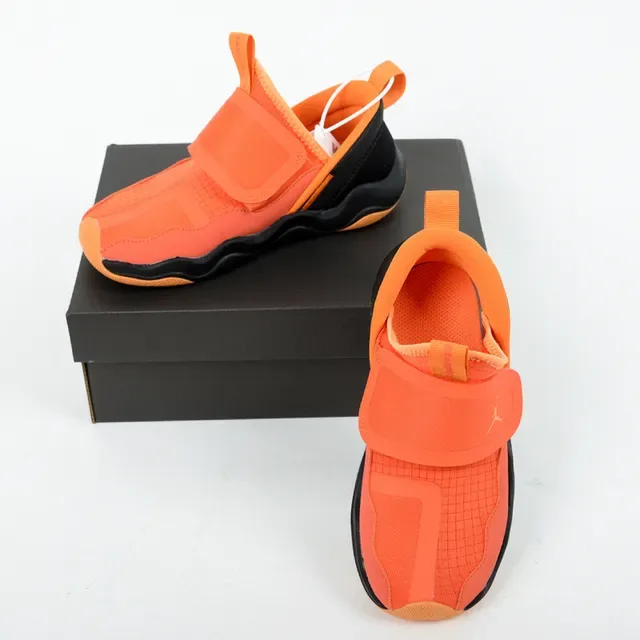 Sneakers lifestyle sans lacets Air Jordan à semelle intermédiaire ondulée orange et noir 10