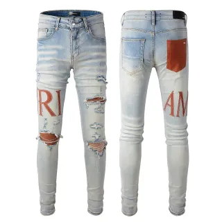 Amiri Logo Print Distressed Skinny Jeans
