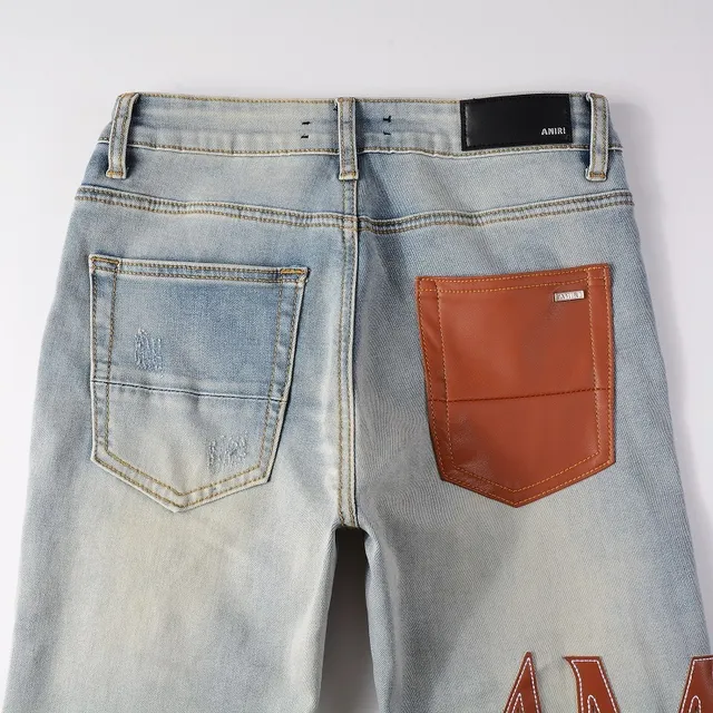 Amiri jeans skinny distressed com logo print 14