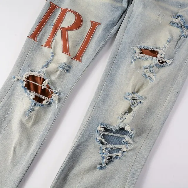 Amiri jeans skinny distressed com logo print 15