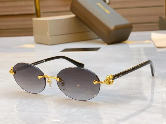 Bvlgari Óculos de sol marrom dourado sem aro oval carey hastes 4