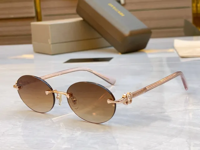 Bvlgari Óculos de sol marrom dourado sem aro oval carey hastes 5