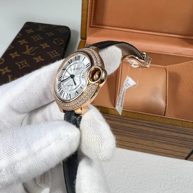 Cartier Ballon Bleu de Cartier bisel pavé de diamants montre mécanique 6