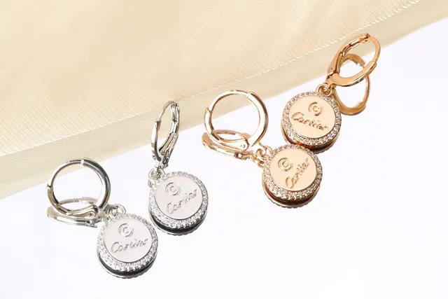 Cartier Boucles d'oreilles de disque circulaire en or et argent avec halo de cristal pavé 4