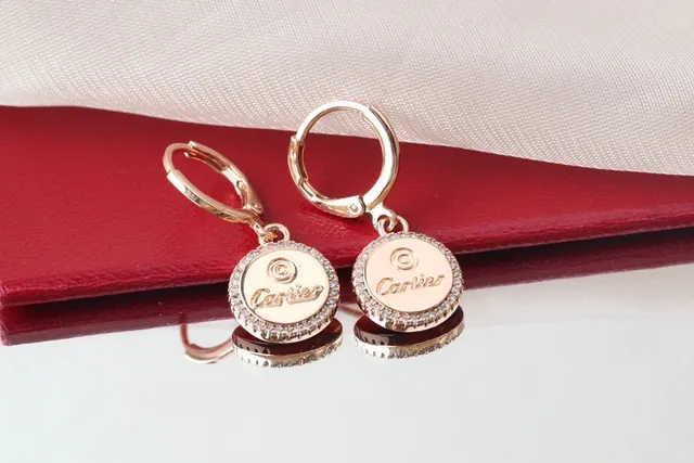 Cartier Boucles d'oreilles de disque circulaire en or et argent avec halo de cristal pavé 8