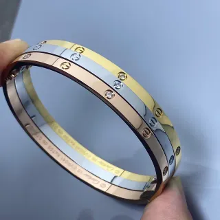 Cartier Pulsera de oro plata triple tono con diamantes engarzados con tornillos