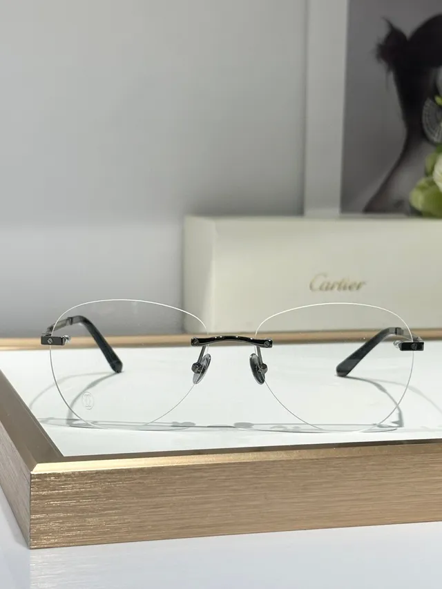 Cartier Lunettes Optiques Ovales Sans Monture Dorées Transparentes 9