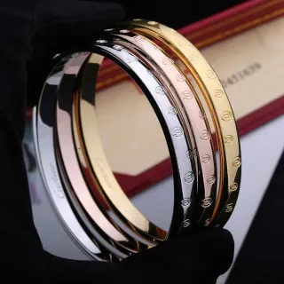 Cartier Trinity Engraved Three-Tone Gold Bracelets