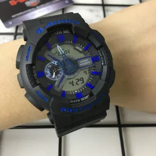 Casio G-Shock GA-100 Montre Sportive Noire et Bleue