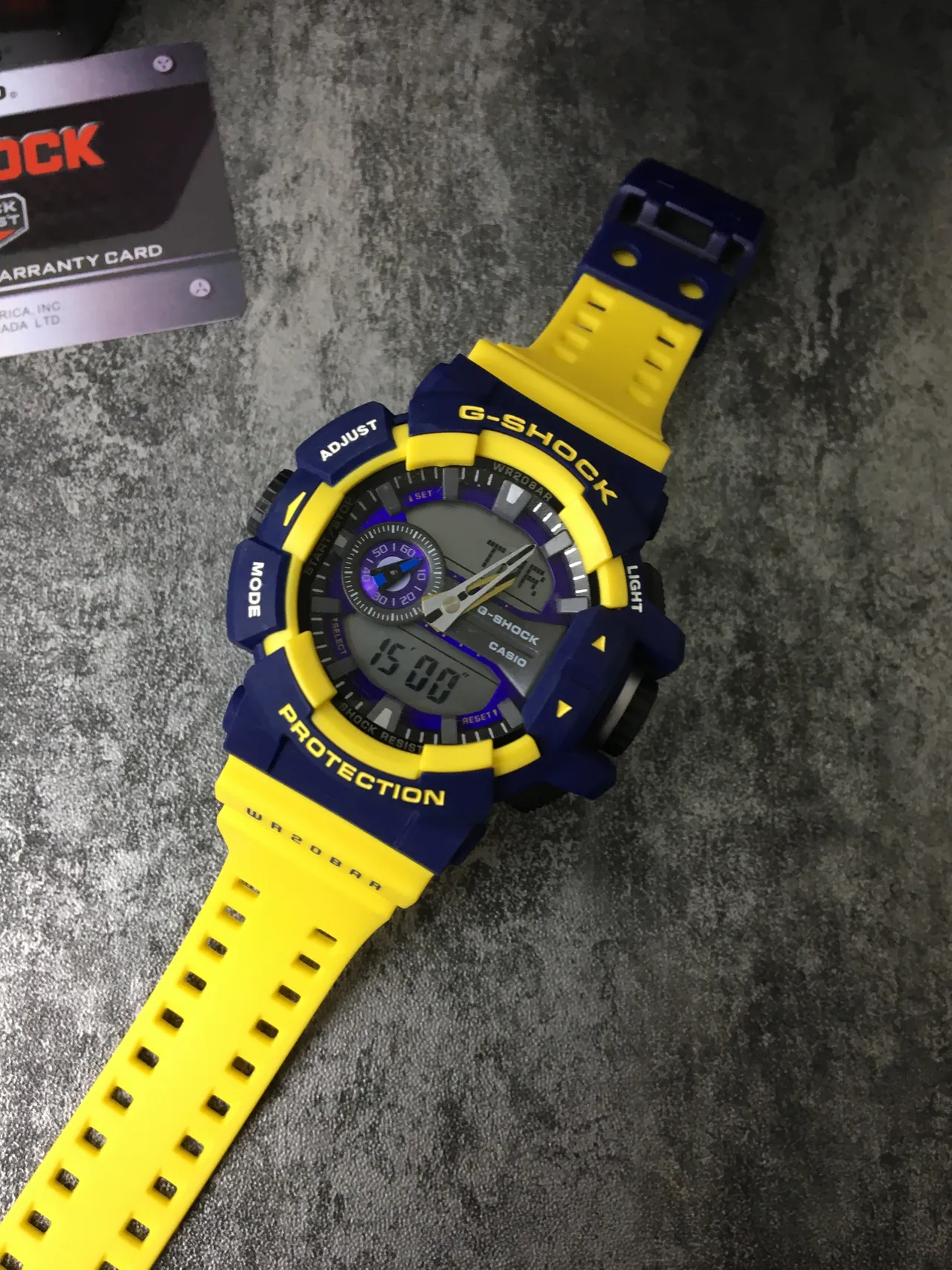Casio G-Shock GA-100 أصفر وأزرق بحري ساعة رياضية 7