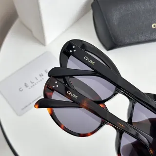 Celine Lunettes de soleil noir marron cadre ovalé acétate construction