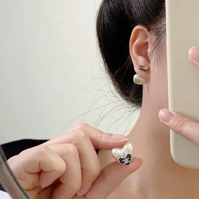Celine Heart-Shaped Pearl and Gold-Tone Stud Earrings 9