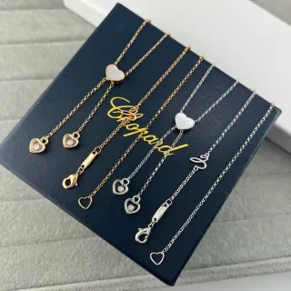 Chopard Happy Hearts Pendentifs en forme de cœur en or et argent Chaînes délicates à maillons Collier