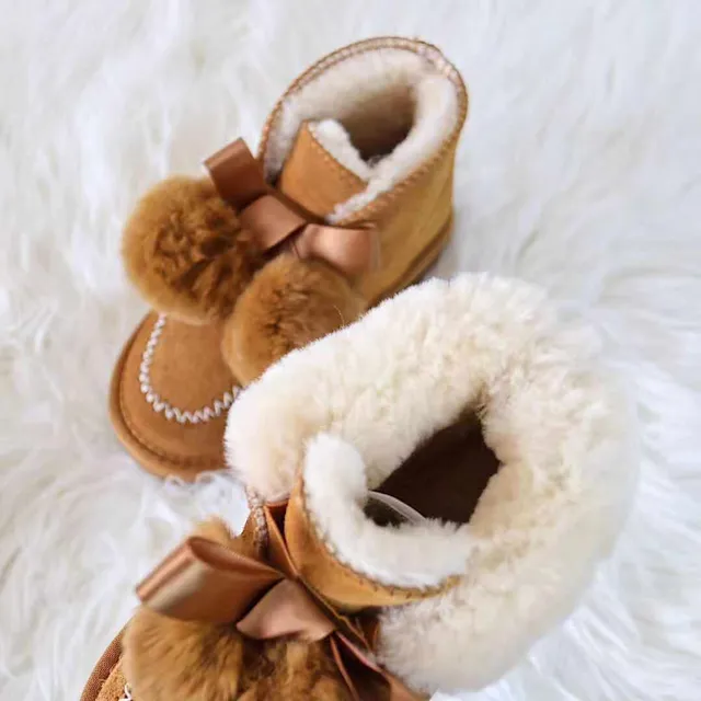 Botines de neige en fourrure avec pompon cousu en moccasin noir et rose 6