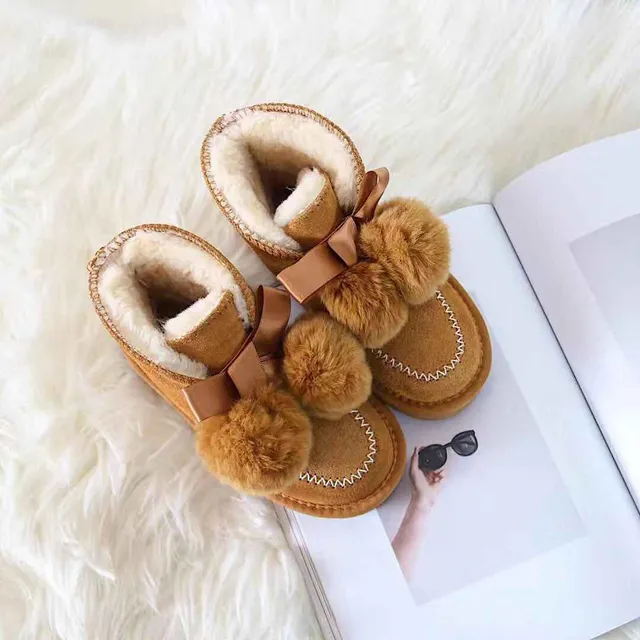 Botines de neige en fourrure avec pompon cousu en moccasin noir et rose 10