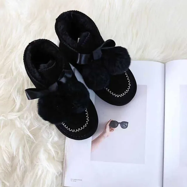 Botines de neige en fourrure avec pompon cousu en moccasin noir et rose 16