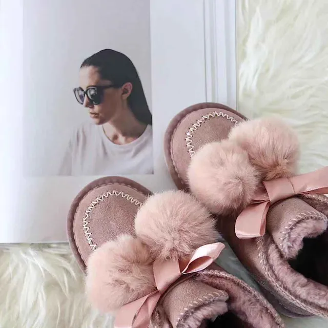 Botines de neige en fourrure avec pompon cousu en moccasin noir et rose 21