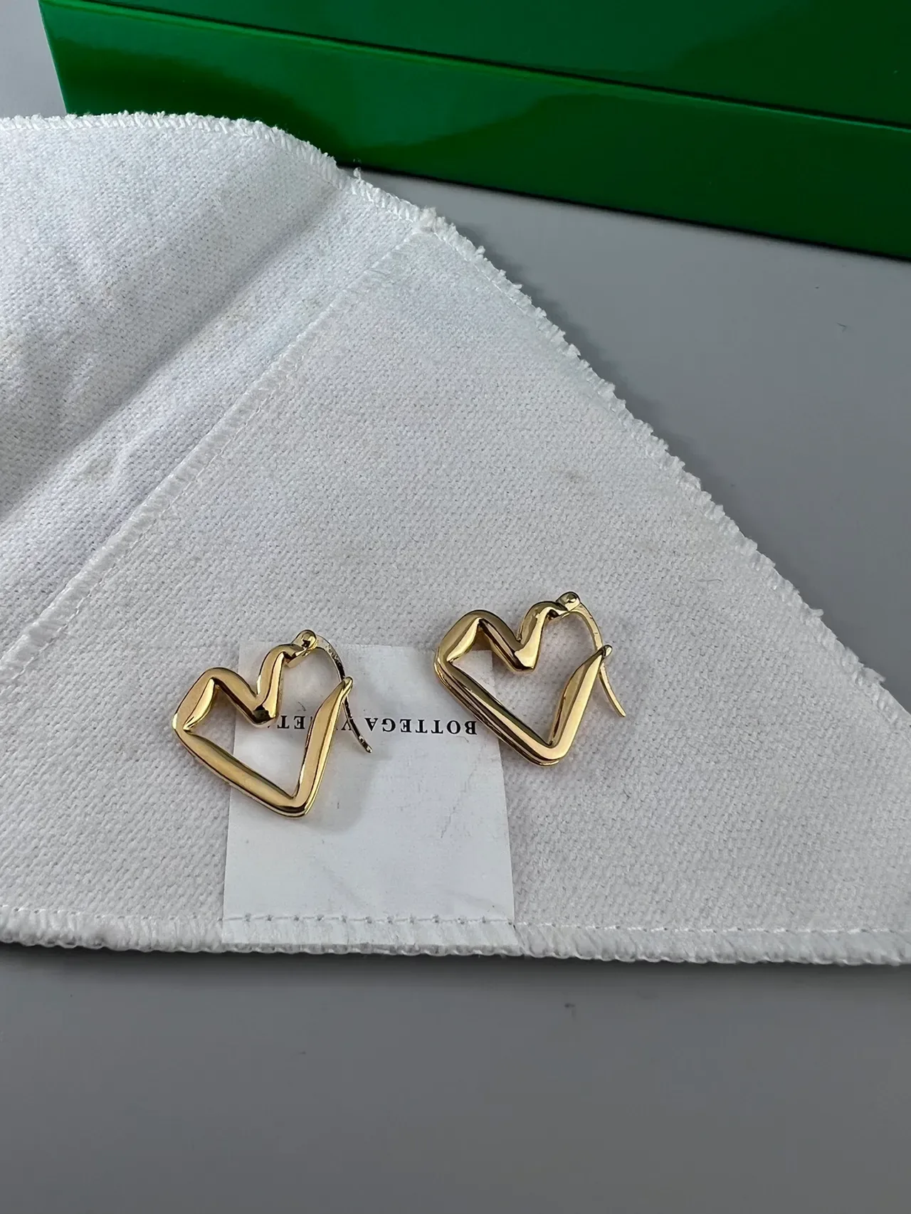 Gold and Silver Heart-Shaped Open Hoop Earrings 8