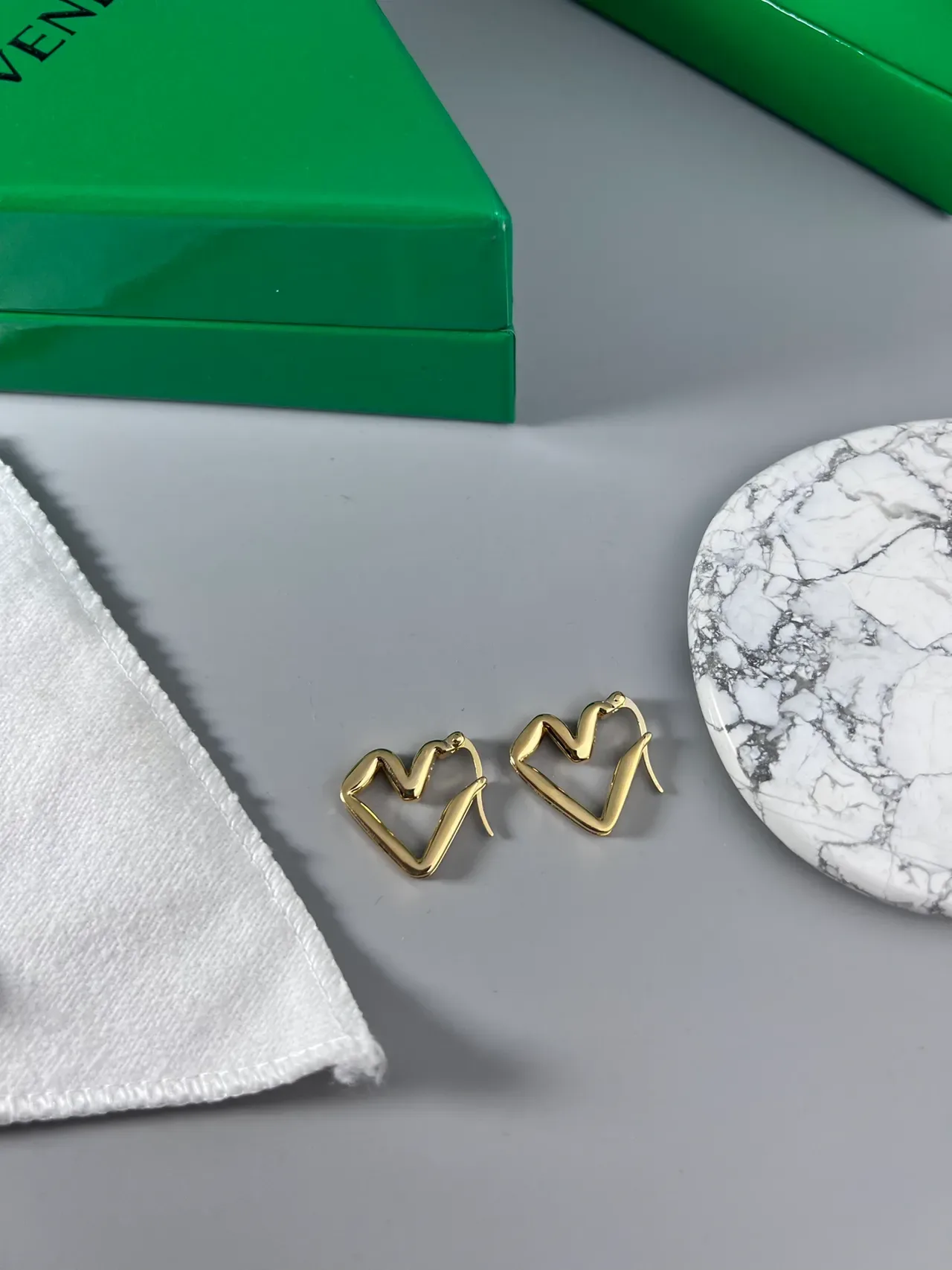 Gold and Silver Heart-Shaped Open Hoop Earrings 9