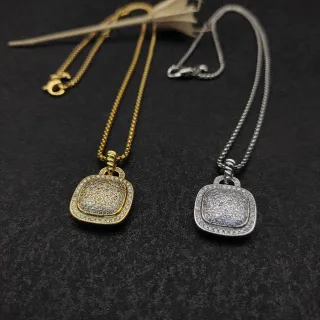 Colliers avec pendentif coussin pavé en ton or et argent