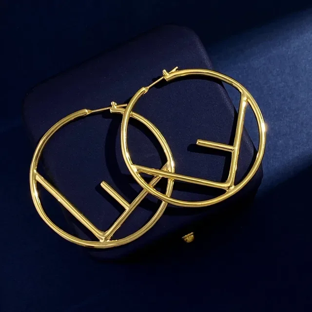 Gold and Silver Two-Tone Geometric Hoop Earrings 9