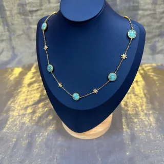 Chaîne dorée bleue cabochon turquoise stations collier