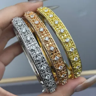 Pulsera de filigrana lattice con piedras pavé-set en oro y plata