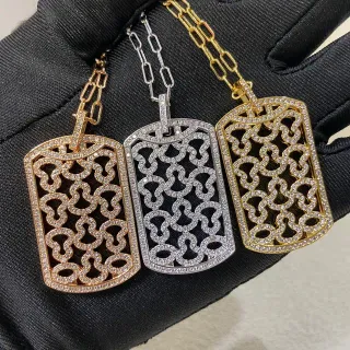Collier filigrané or et argent pavé découpé