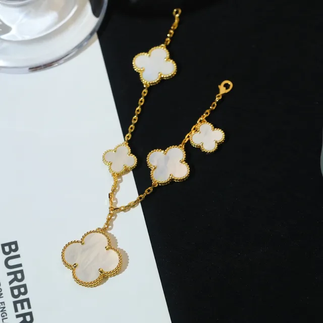Gold-Tone Five Clover Charm Bracelet 9