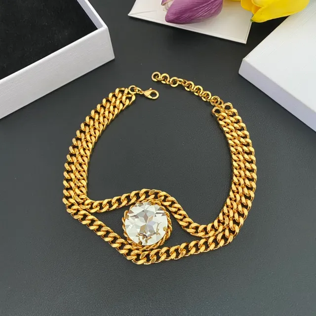 Collier chaîne Curb dorée transparente chunky avec centre de cristal facetté 6