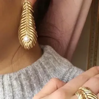 Gold Transparent Feather Motif Textured Ridged Surface Earrings