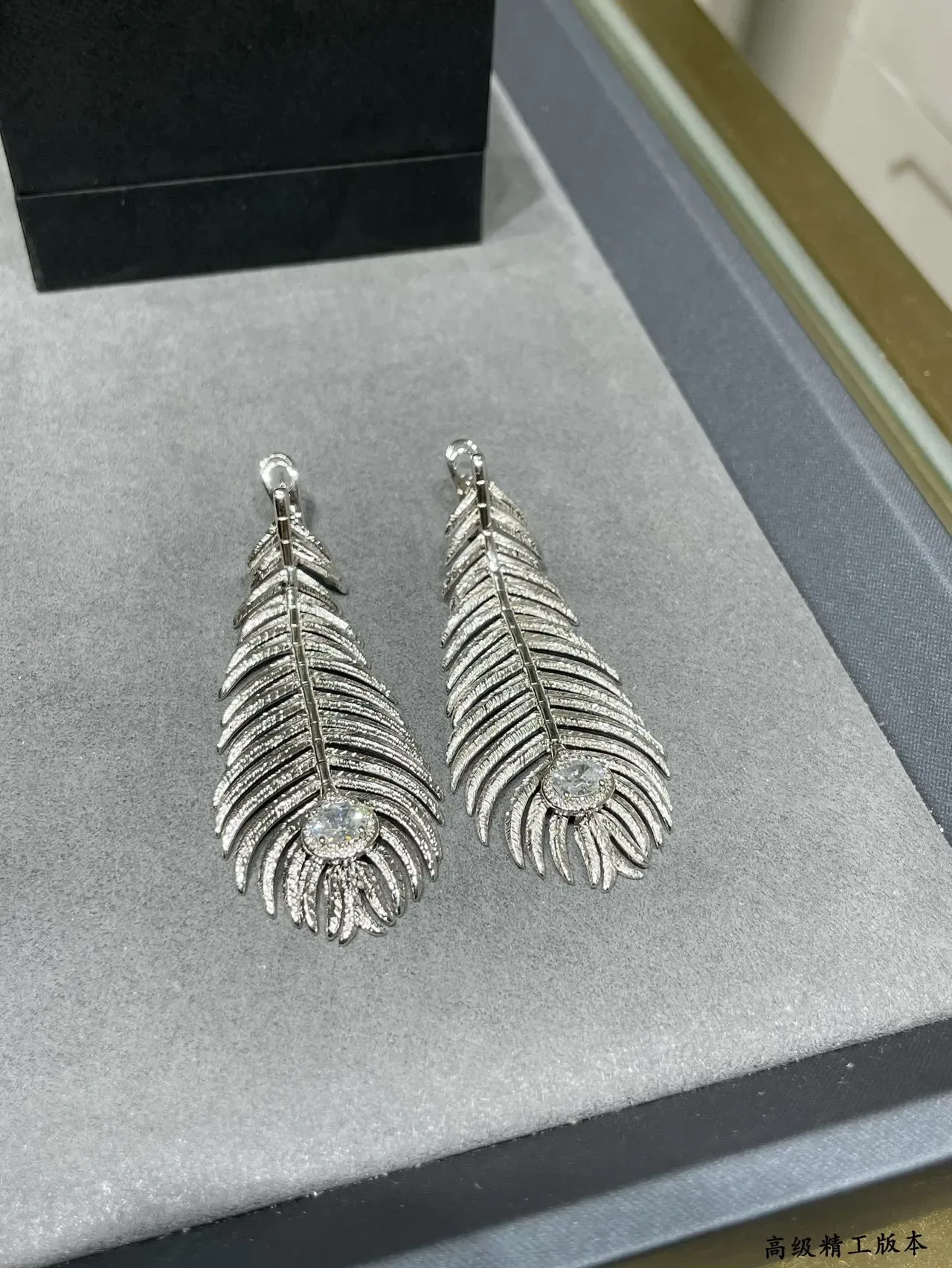 Gold Transparent Feather Motif Textured Ridged Surface Earrings 4