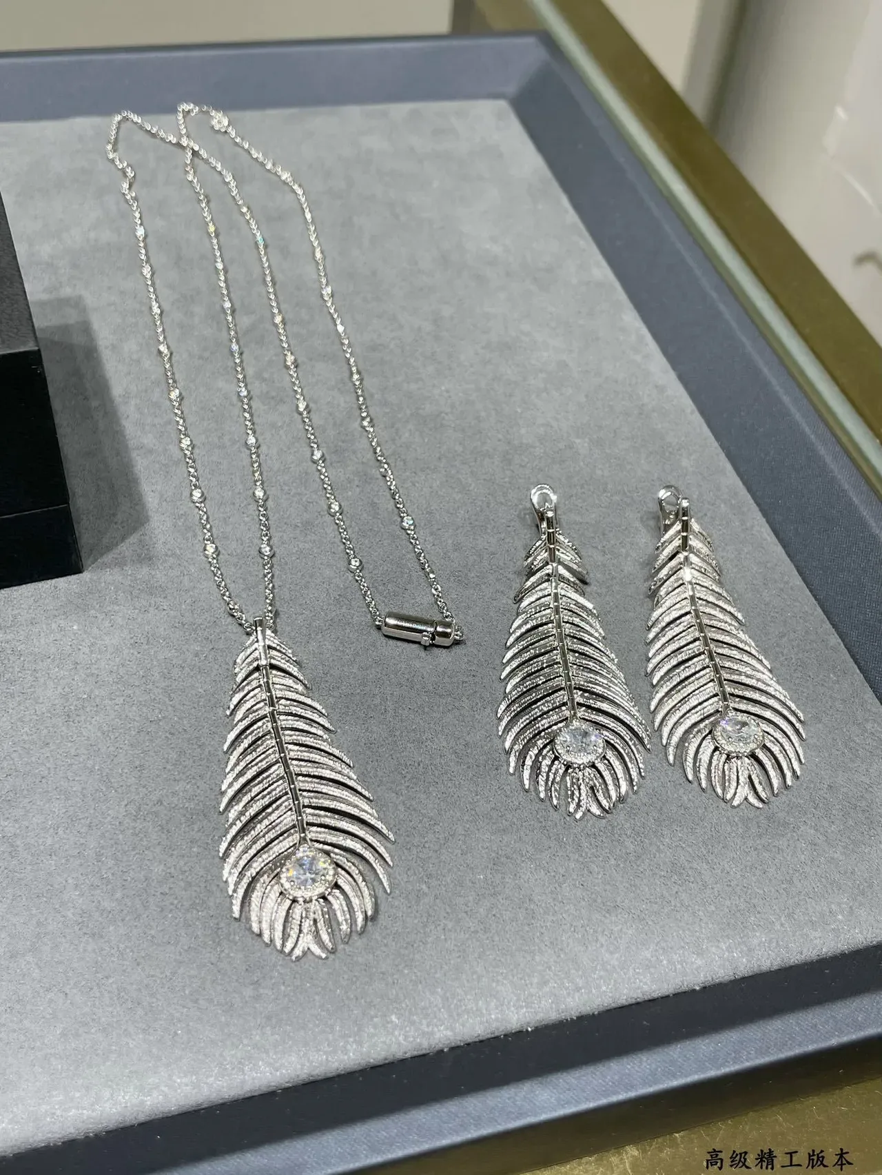 Gold Transparent Feather Motif Textured Ridged Surface Earrings 6