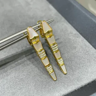 Gold White Segmented Dagger-Shaped Metal Earrings