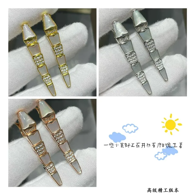 Gold White Segmented Dagger-Shaped Metal Earrings 2