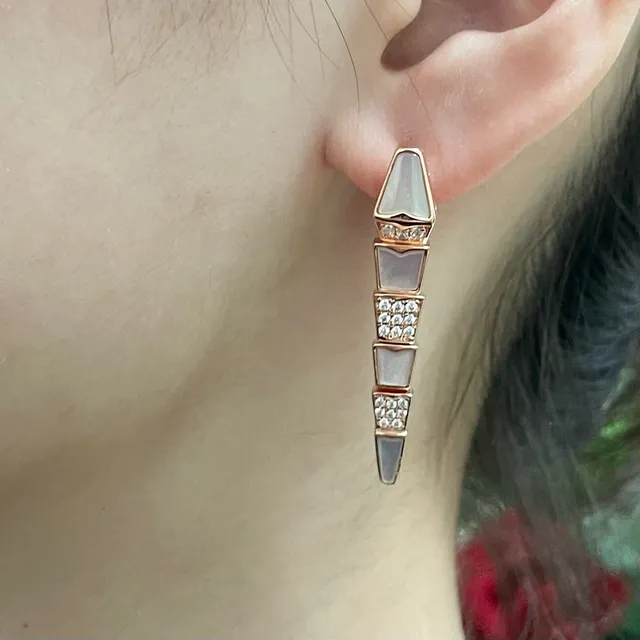 Gold White Segmented Dagger-Shaped Metal Earrings 7