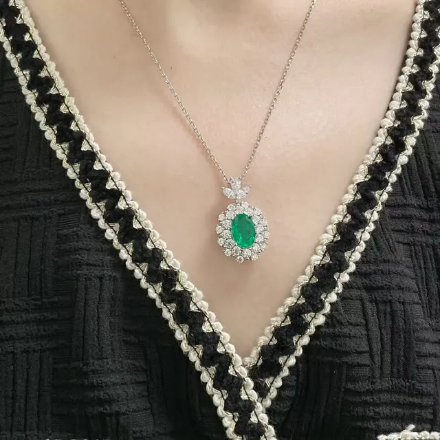 Oval Emerald and Diamond Halo Pendant Necklace 9