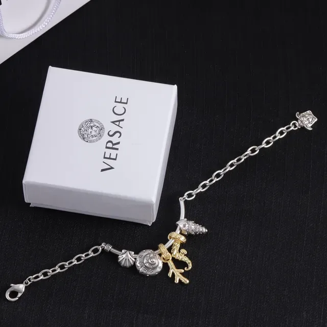Silver and Gold Tone Multi-Charm Chain Bracelet 2