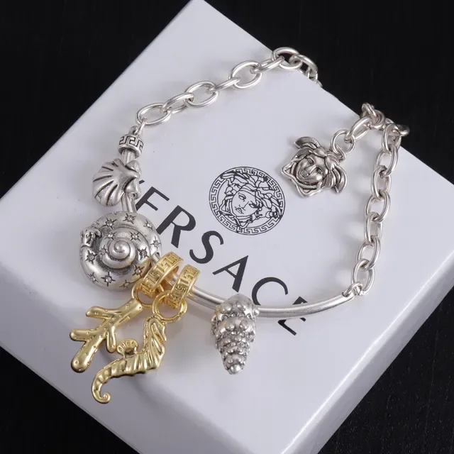 Silver and Gold Tone Multi-Charm Chain Bracelet 4