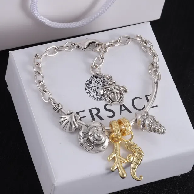 Silver and Gold Tone Multi-Charm Chain Bracelet 5